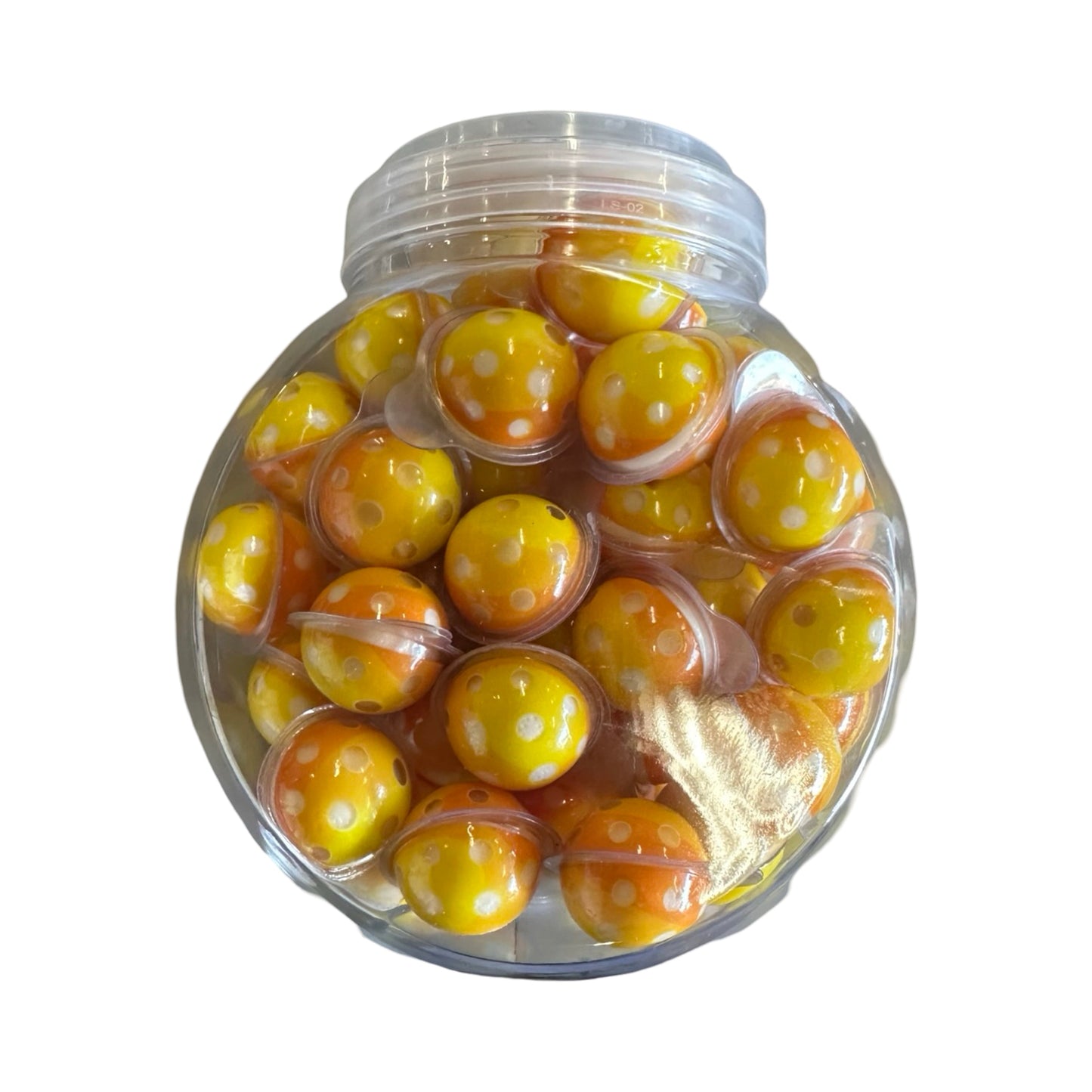 Jar of Pickleball Gummy Candy, featuring vibrant yellow and orange gummy candies shaped like pickleballs.