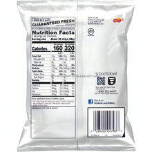 Nutrition facts panel on the back of Fritos Original 2 Oz bag, showcasing calories and serving information.