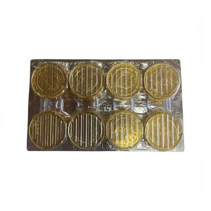 Nucita Monedas milk chocolate coins wrapped in gold foil, displayed in a tray, ideal for bulk Mexican candy.