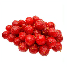 Oy Chamoy! Chamoy Covered Sour Cherry Bites piled together, showcasing their vibrant red color and tangy coating.