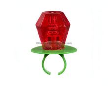 Colorful red Ring Pop candy mounted on a green plastic ring, representing bulk American candy.
